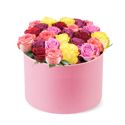 Imagine stepping into a sunlit studio near Canonbury's leafy streets, where Canonbury Flowers has arranged a plush round hat box, softly pink, resting on a clean white backdrop. The velvet-like finish invites a touch, a modern twist on a timeless gift. From its crown overflow dozens of roses, freshly cut, their petals opening to reveal a lush, domed bouquet. The color spectrum reads like a midsummer garden: bright yellow that feels like sunshine, deep crimson that speaks of romance, magenta that pulses with energy, bubblegum pink that feels playful, and bi-color blooms that melt from pink to cream as if kissed by dawn. The roses are tightly clustered, creating a sculpted tapestry with minimal greenery to let color take the lead. The arrangement exudes contemporary sophistication while remaining warm and inviting-a versatile gift for birthdays, anniversaries, or a spontaneous celebration. Delivery is available across Canonbury, Islington, and nearby neighbourhoods, making this hat-box rose arrangement a refined centerpiece for a home, an office, or a thoughtful surprise. Crafted with careful doming, precise color balance, and a soft, glossy box texture, it clearly bears the mark of a skilled local florist. It's a bouquet that can soften a room with fragrance and color, a symbol of luxury and care from Canonbury Flowers, ready for same-day delivery where available.