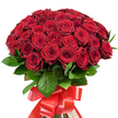 Presented against a crisp white background, this sumptuous bouquet overflows with approximately fifty to sixty red roses, their blooms arranged so densely they create the impression of a velvet sea in full bloom. The dome-shaped arrangement is expertly crafted, highlighting the full, rounded forms and the intricate, spiraled petals of each crimson blossom. Some roses remain tightly closed, while others are open, their layered interiors hinting at secrets still to unfold. Intermingled among the sea of red are glossy, deep green leaves that glisten softly-much like the foliage found in the quieter corners of Canonbury, not far from the local flower market. The stems are securely tied at the base with an impressively wide red satin ribbon, meticulously knotted into a large, elegant bow. Its trailing ends add a celebratory, almost theatrical flourish that speaks to finely honed local craftsmanship. The bouquet radiates feelings of passion, romance, and heartfelt appreciation-ideal for expressions of love during anniversaries, special celebrations, or moments that call for an unforgettable gesture. Imagine the heady fragrance and the soft texture beneath your fingertips; this is a bouquet born from the skill and care of Canonbury florists, evoking the elegance and emotional richness of the neighbourhood it comes from.