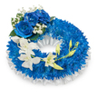 A round sympathy wreath presented against a crisp white background, its surface a dense carpet of small, deep blue chrysanthemum blooms that form a plush, textural ring. The chrysanthemums' fine, spidery petals create a velvety, almost tactile field of sapphire and cobalt, while a soft, ruffled white satin ribbon traces the inner circumference and peeks beneath the outer edge, giving the arrangement a pleated, refined frame. At the upper-left quadrant three large, fully opened blue roses anchor the composition-their velvety, layered petals in a rich azure tone catching the light with a quiet depth. These roses are gently nestled among tiny sprays of white baby's breath and touches of dark green foliage, which add delicate contrast and a classic, comforting note.
From the mid-left the design flows into a graceful cascade of pristine white orchid blooms, their smooth, luminous petals arching toward the lower-right and drawing the eye along the wreath's curve. Interspersed among these orchids are pale green buds at various stages of opening, a subtle symbol of renewal threaded through the tribute. The overall palette of midnight blues and pure whites conveys serene remembrance and dignity; the textures-fuzzy chrysanthemum heads, silky rose petals, airy gypsophila, and glossy orchid blooms-combine to create a composition that feels both composed and tender. Perfect for a memorial or funeral service close to Canonbury Square or a quiet tribute along Essex Road, this wreath radiates respectful calm and thoughtful craftsmanship suited to honouring a loved one.