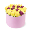 An elegant, modern expression of joy from Canonbury Flowers, this round pastel pink gift box houses a dense dome of roses that feels both bold and intimate. The box rests against a pristine white field, its soft-touch, curved exterior complementing the compact bouquet within. The blooms unfold as a chorus of bright yellow roses-sunny, lively, and inviting-interwoven with carefully placed deep purple or burgundy roses that add depth, romance, and a touch of luxury. The cluster is packed tightly, rising slightly above the rim of the box to convey abundance and skilled craftsmanship. The pale pink container enhances the premium feel, its velvet-like texture catching the eye as much as the petals catch the light. This image speaks of contemporary luxury, ideal for celebrations, heartfelt thanks, or a spontaneous gesture of affection. For shoppers across Canonbury and nearby districts such as Dalston and Highbury, the arrangement is available for same-day delivery, bringing a bright memory to birthdays, anniversaries, or moments of congratulations. It's a crafted moment of local expertise-flowers chosen with care, designed to be enjoyed in homes across Islington and beyond, where the scent of fresh stems lingers as a reminder of a thoughtful, stylish gift.